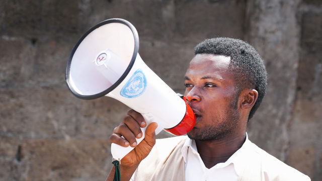 Man with loudspeaker